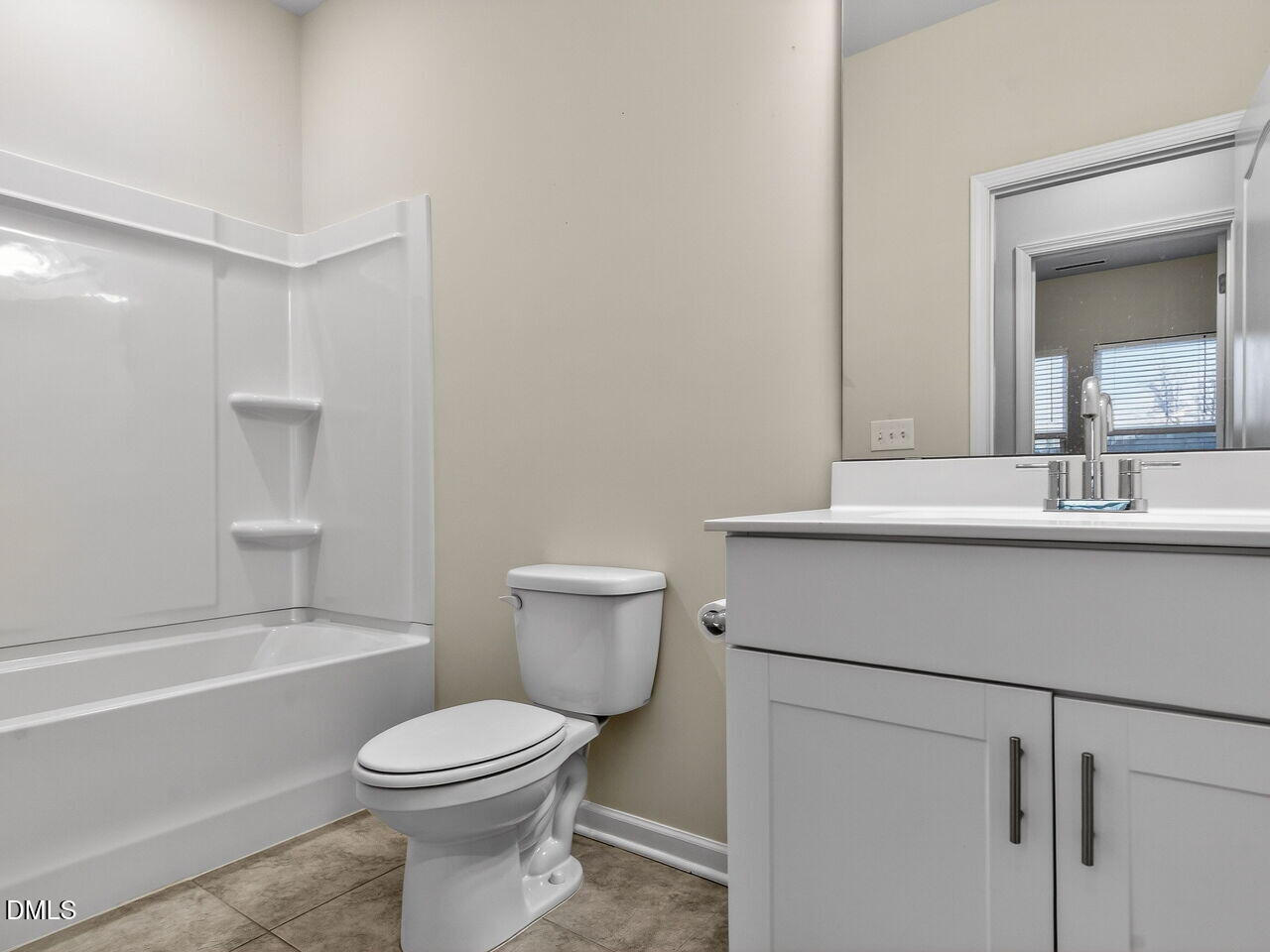 67 Coffee Tree Circle Clayton, NC 27527 - Photo 16 of 34 a bathroom with a sink a toilet and shower