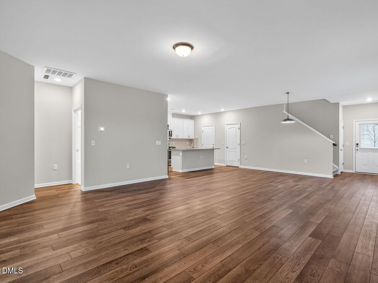 67 Coffee Tree Circle Clayton, NC 27527 - Photo 8 of 34 a view of empty room with wooden floor and window