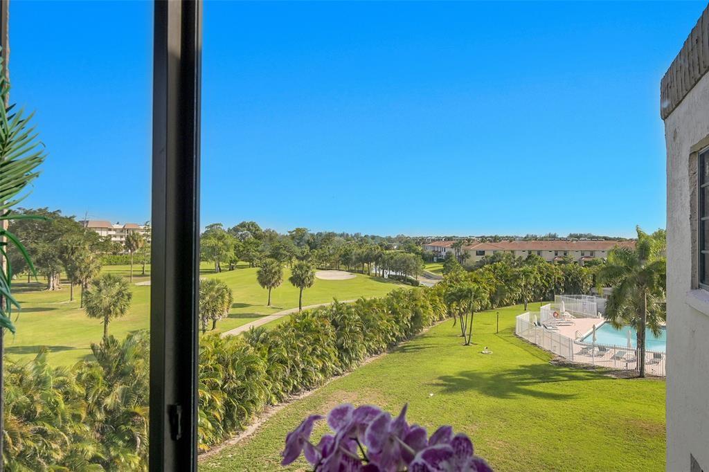 9300 Southwest 8th Street, Unit 422 Boca Raton, FL 33428 - Photo 3 of 38 a view of an ocean from a balcony