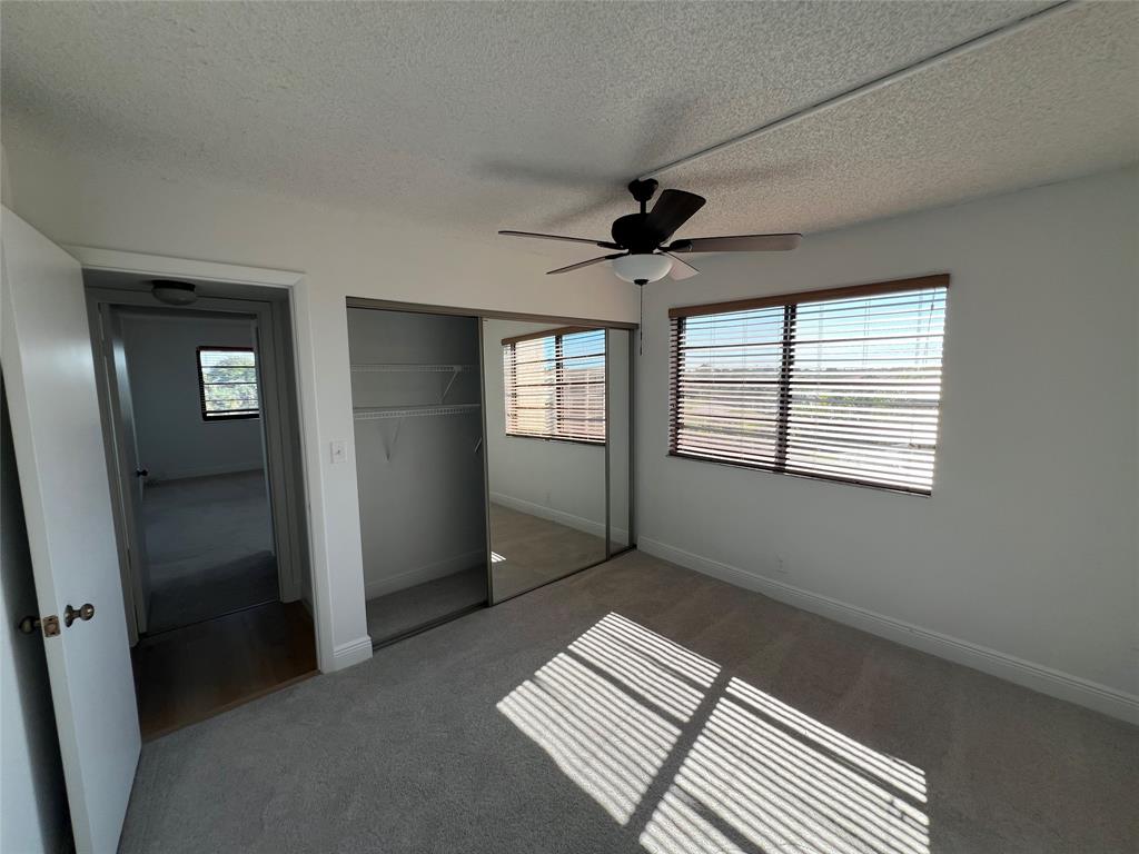 9300 Southwest 8th Street, Unit 422 Boca Raton, FL 33428 - Photo 33 of 38 a view of an empty room with a window