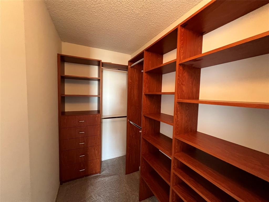 9300 Southwest 8th Street, Unit 422 Boca Raton, FL 33428 - Photo 34 of 38 a view of walk in closet