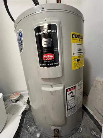 a kitchen with granite countertop stainless steel appliances and wooden cabinets