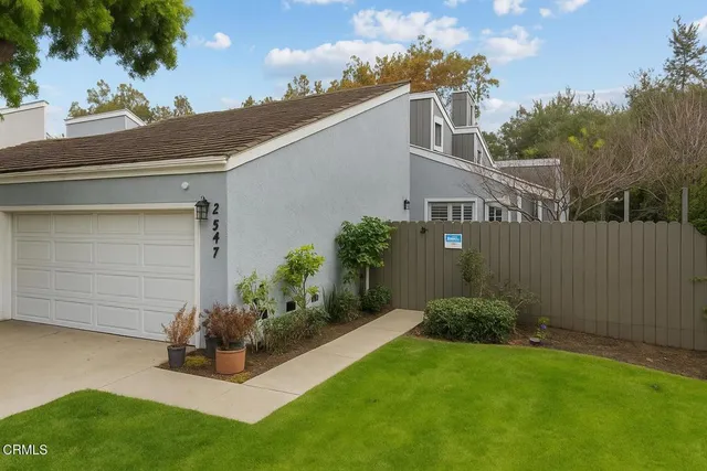 a view of a back yard of the house
