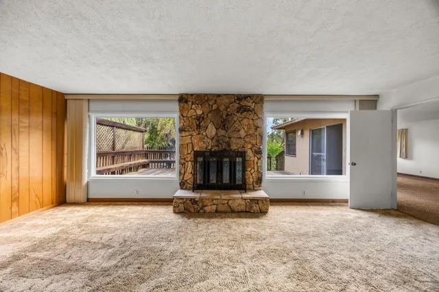 an empty room with windows