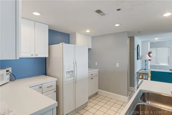 $245,000 | 44 Emerald Bay Court, Unit 1B, Lake Ozark, MO 65049