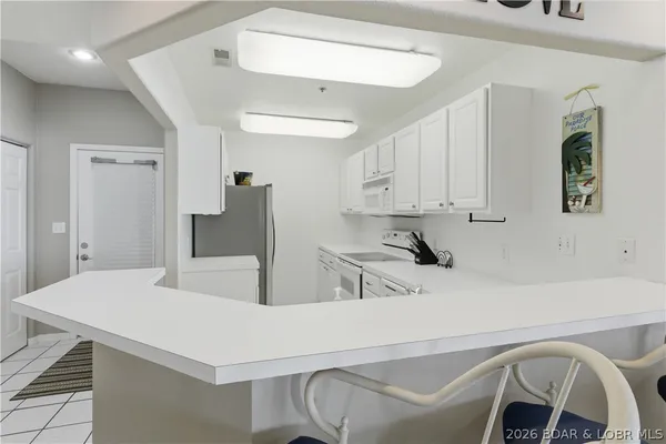 $245,000 | 44 Emerald Bay Court, Unit 1B, Lake Ozark, MO 65049