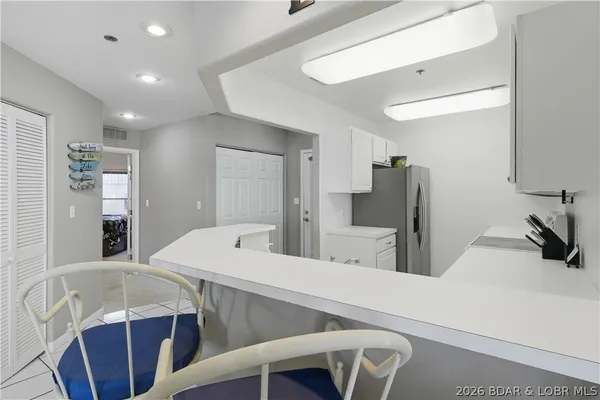 $245,000 | 44 Emerald Bay Court, Unit 1B, Lake Ozark, MO 65049