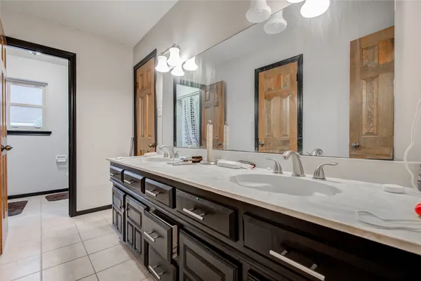 a view of a bathroom from a hallway