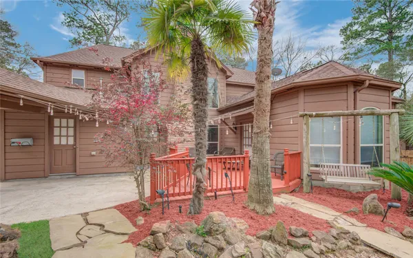 a view of a chairs and table in the patio