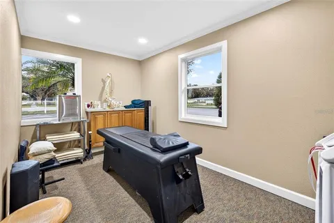 a view of a livingroom with a flat screen tv