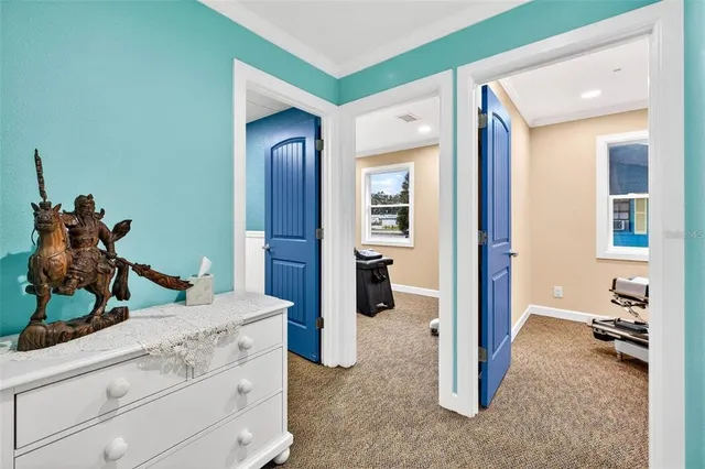 a view of a bathroom from the hallway