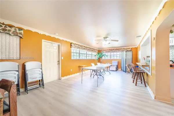 a view of a livingroom with furniture and front door