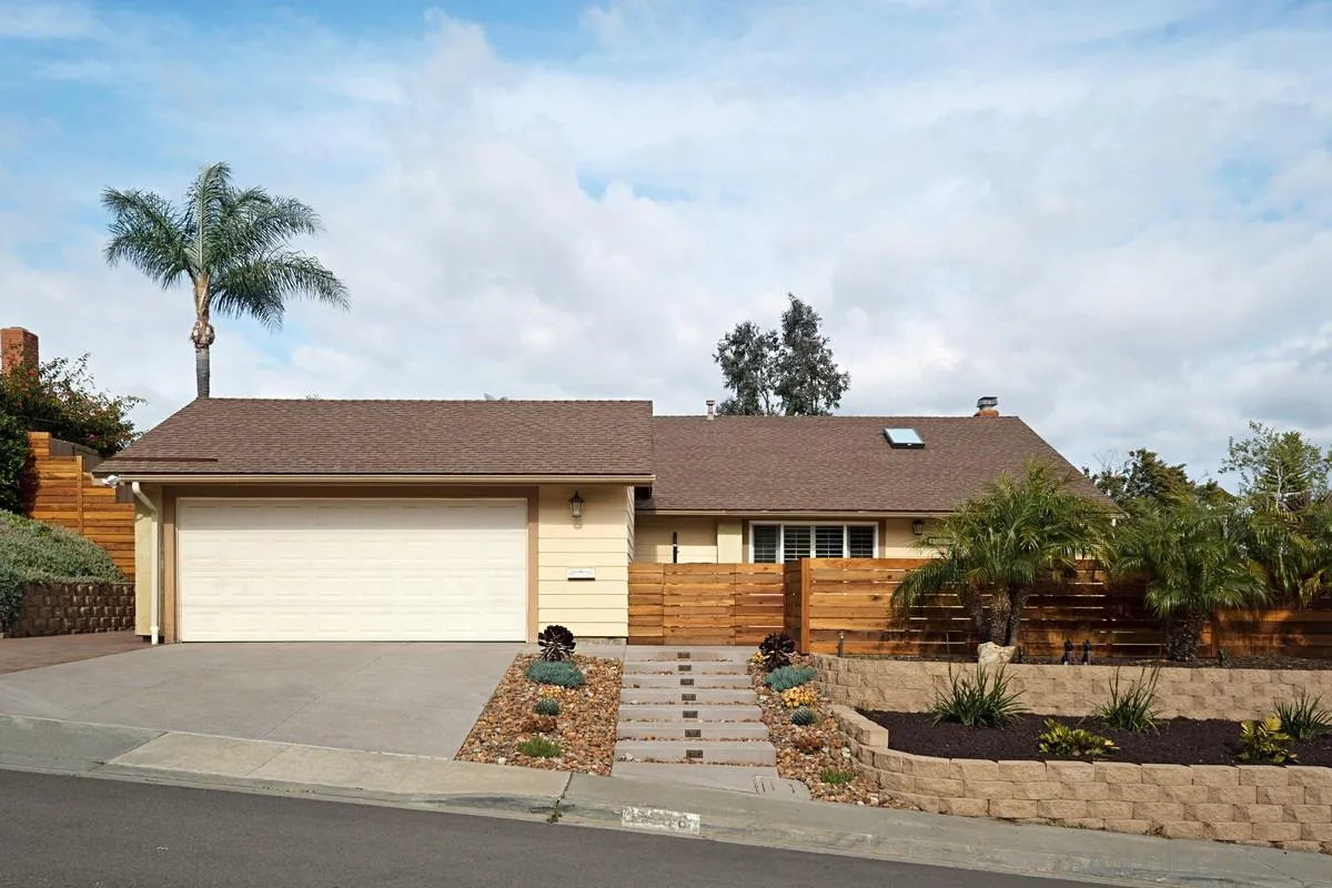 11068 Pinzon Way San Diego, CA 92127 - Photo 1 of 31 a front view of a house with a yard and garage