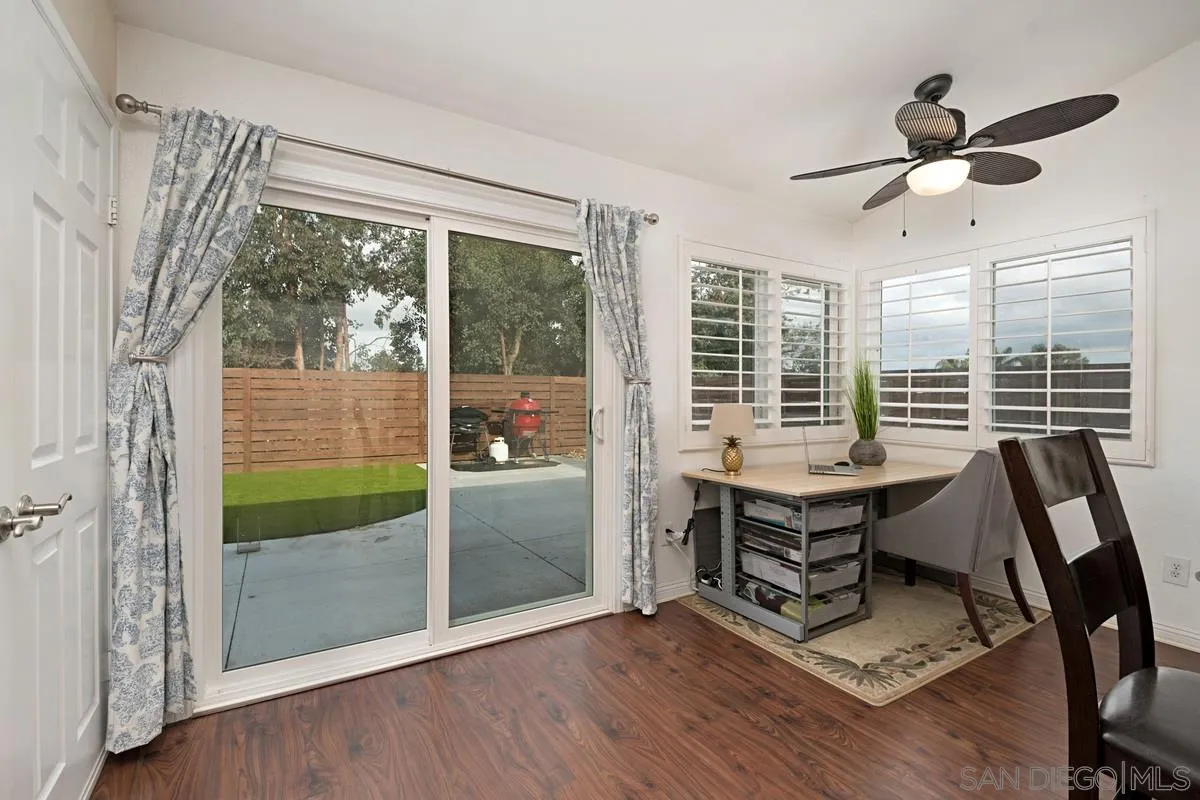 11068 Pinzon Way San Diego, CA 92127 - Photo 14 of 31 a view of a livingroom with furniture and window