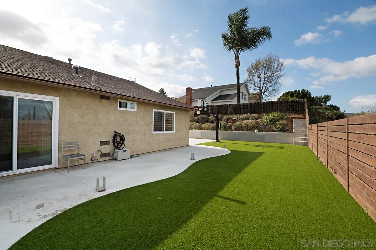 11068 Pinzon Way San Diego, CA 92127 - Photo 22 of 31 a view of a backyard with a sitting area