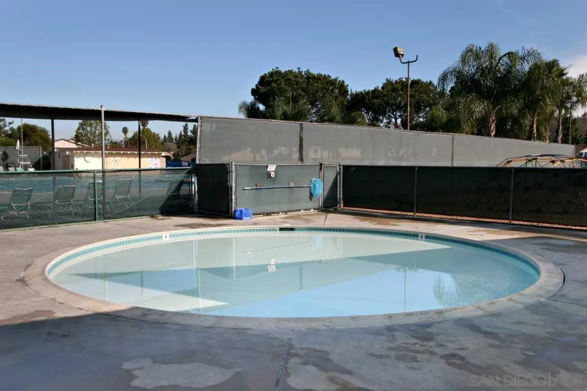 11068 Pinzon Way San Diego, CA 92127 - Photo 29 of 31 a view of a swimming pool with a yard
