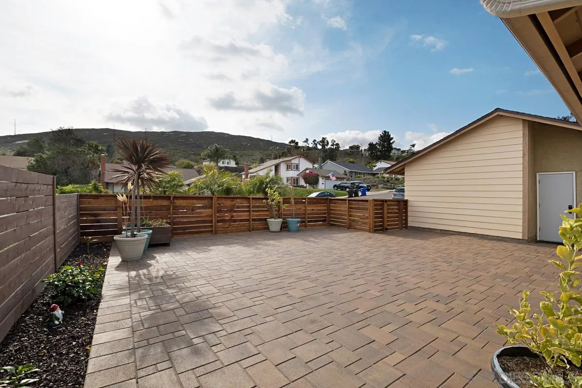 11068 Pinzon Way San Diego, CA 92127 - Photo 3 of 31 a view of city street with mountain view