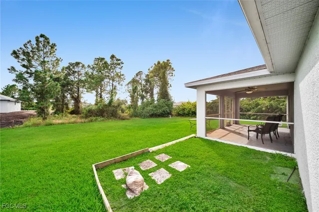 a view of yard with seating area