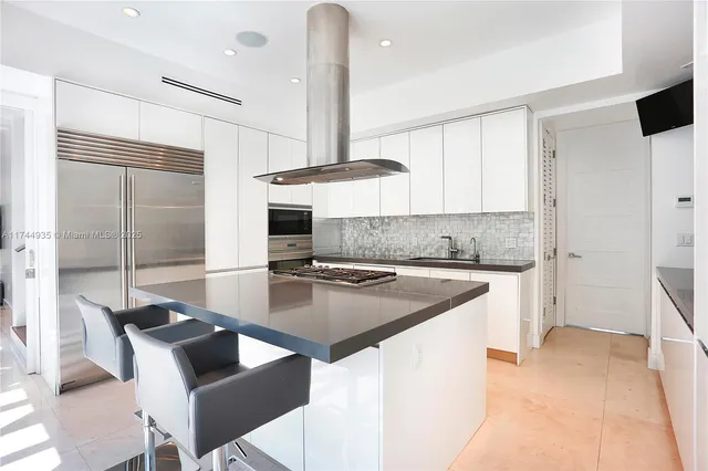 a bathroom with a sink toilet and mirror
