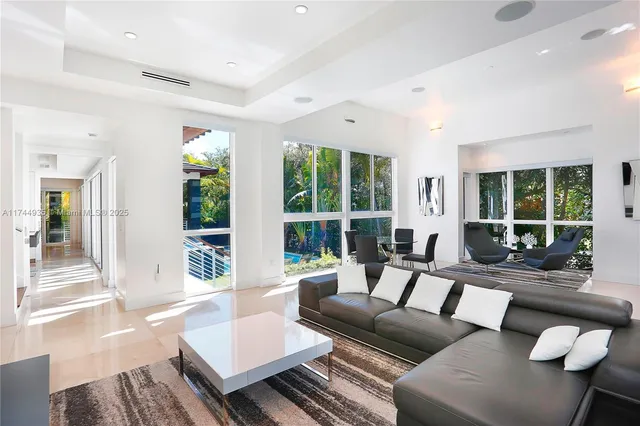 a kitchen with a refrigerator and stove