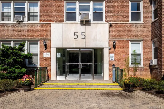 a front view of a multi story residential apartment building