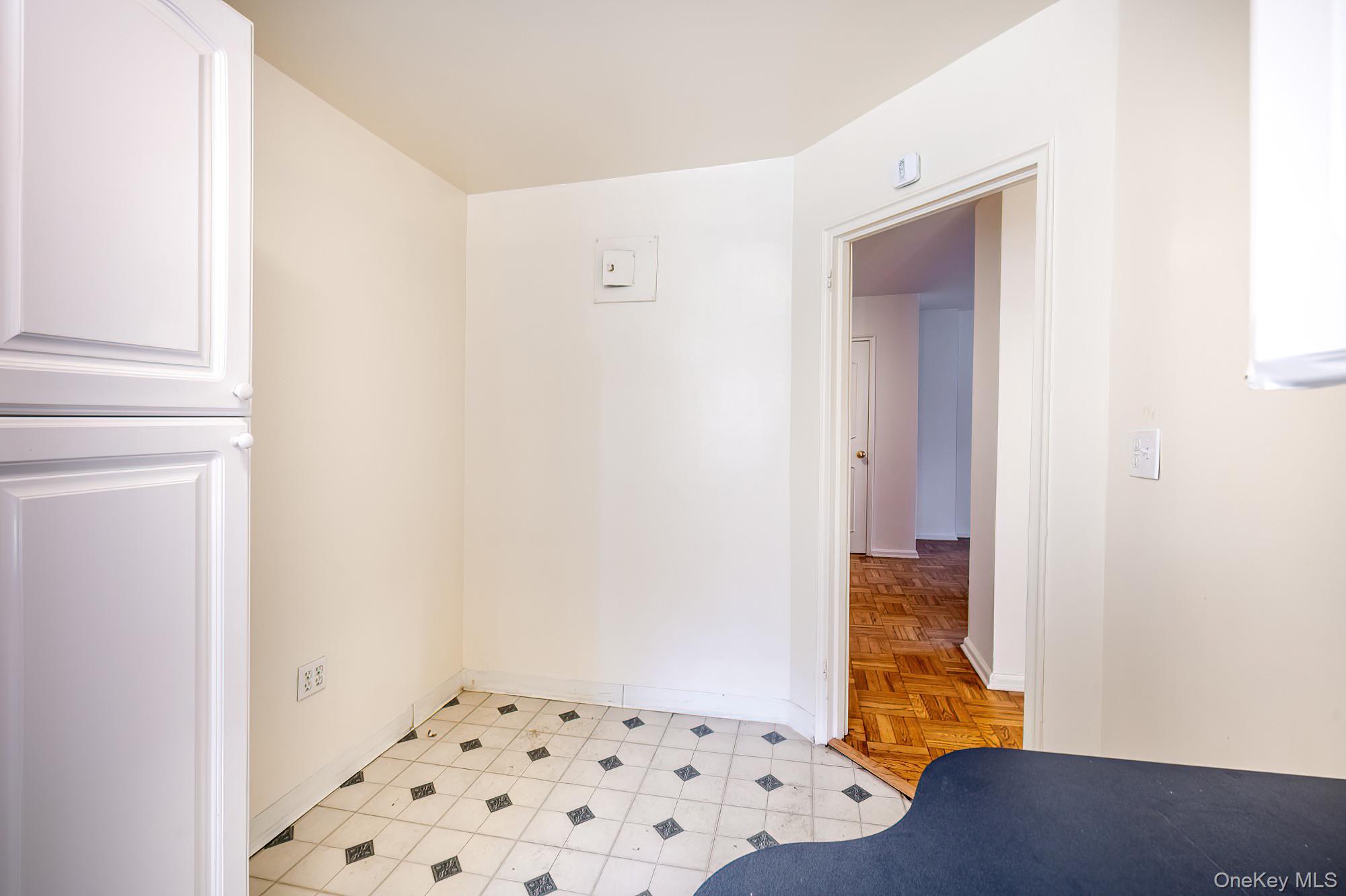 55 Knolls Crescent, Unit 2D Bronx, NY 10463 - Photo 10 of 24 a bathroom with a sink and a mirror