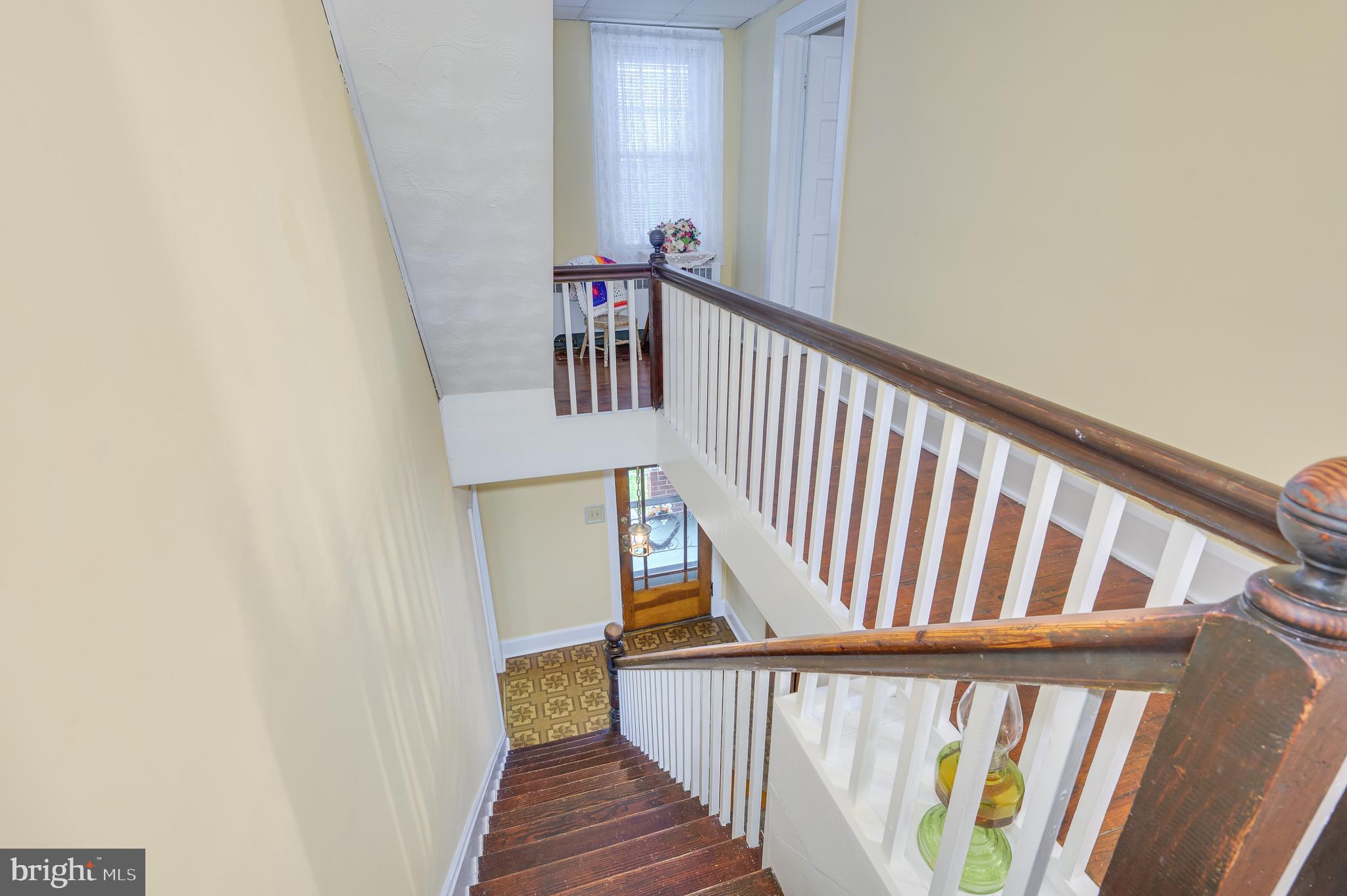 101 North Mildred Street Ranson, WV 25438 - Photo 46 of 75 a view of staircase with wooden floor and white walls