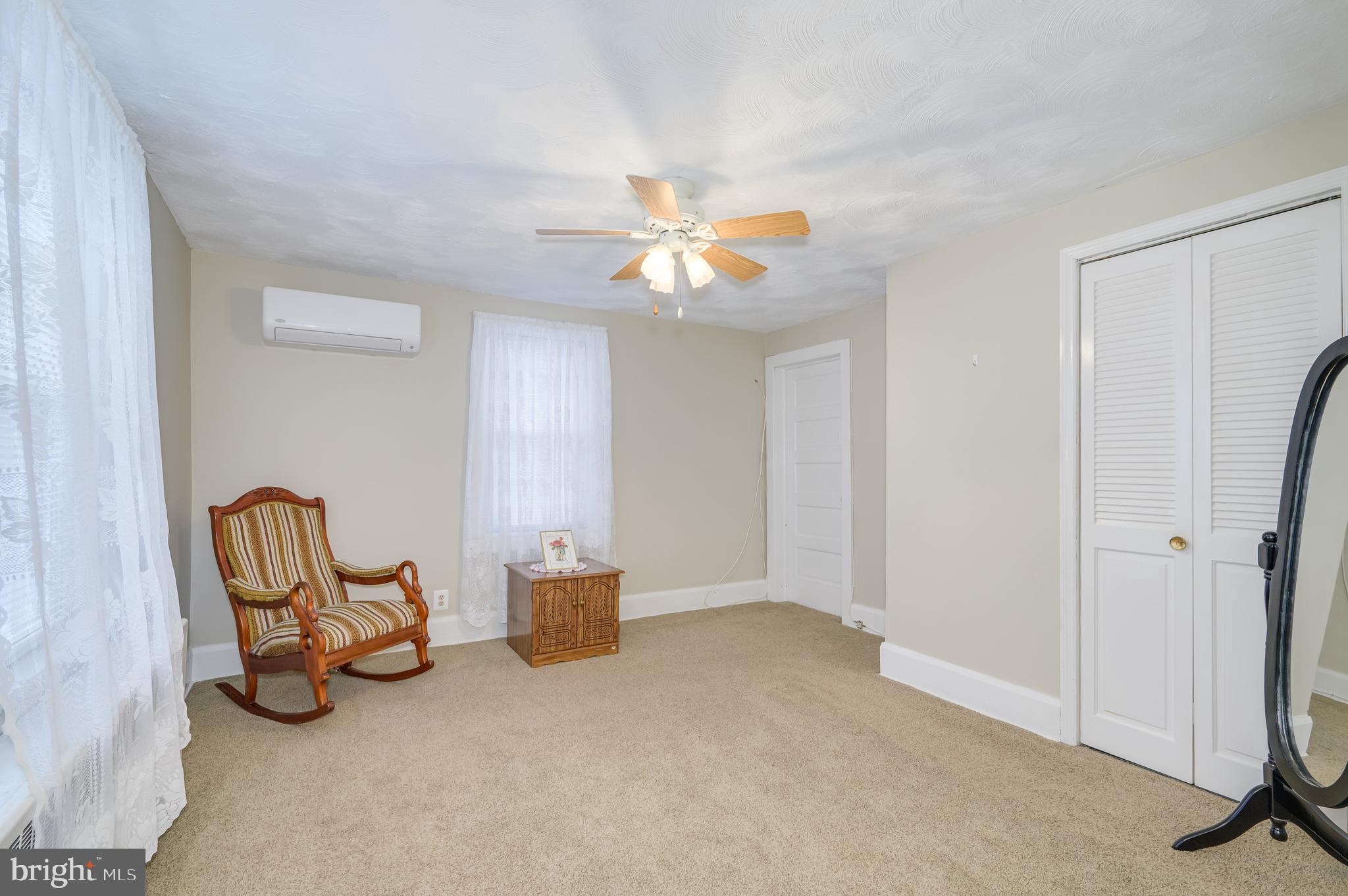 101 North Mildred Street Ranson, WV 25438 - Photo 54 of 75 a view of a livingroom with furniture and a ceiling fan
