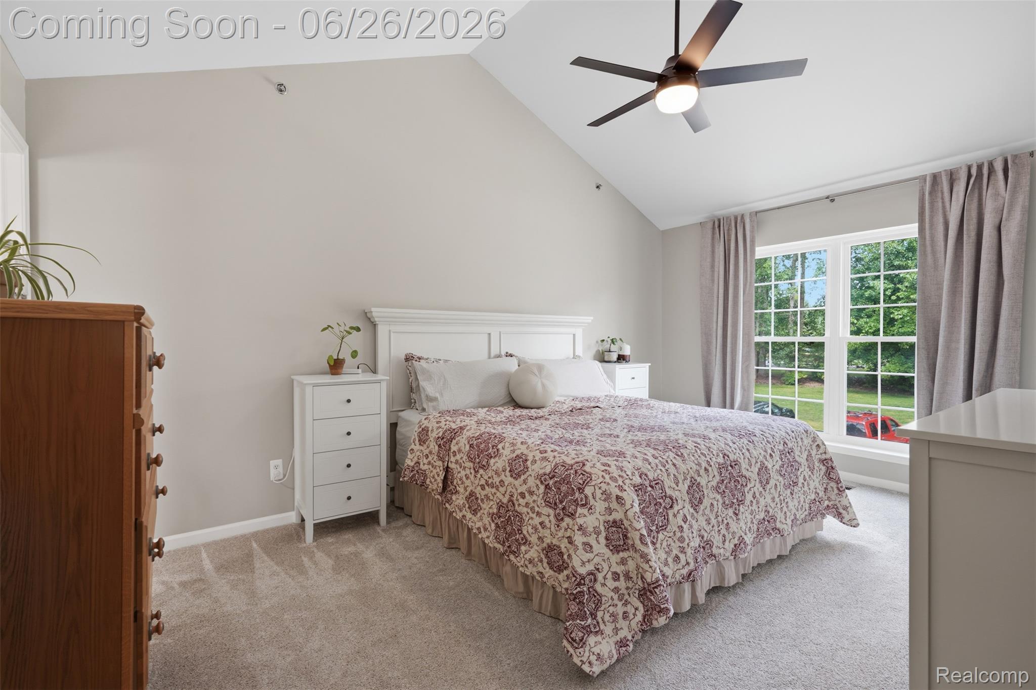 1668 Deepwood Circle Rochester, MI 48307 - Photo 18 of 27 Vaulted ceiling bedroom featuring plush carpeting and a contemporary ceiling fan