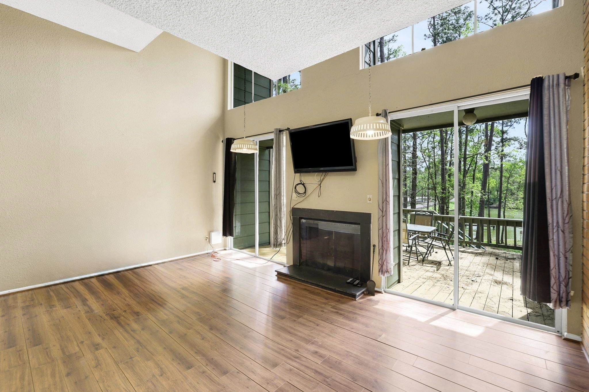 178 Villa Way Coldspring, TX 77331 - Photo 6 of 43 Living area with fireplace