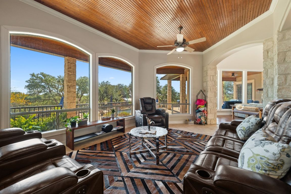 185 Shimmering Shore Court Spring Branch, TX 78070 - Photo 11 of 40 a living room with furniture and a large window