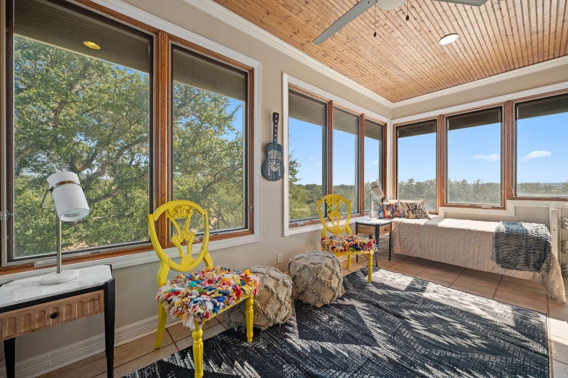 185 Shimmering Shore Court Spring Branch, TX 78070 - Photo 27 of 40 a living room with furniture and floor to ceiling windows