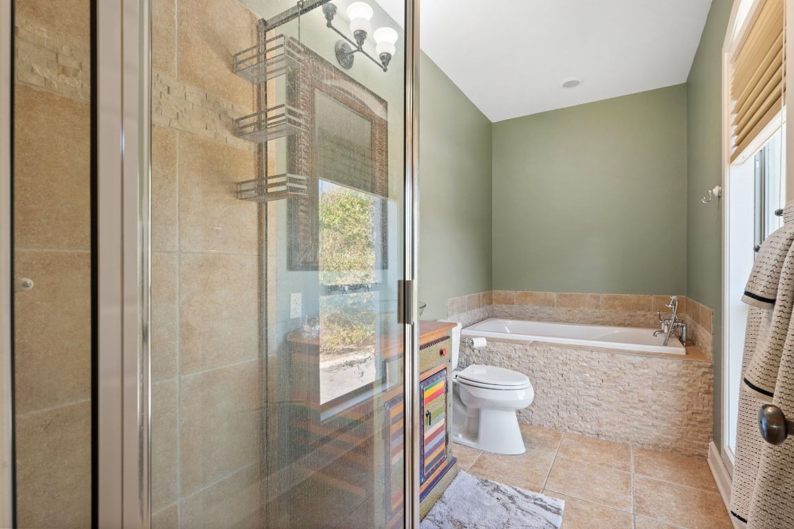 185 Shimmering Shore Court Spring Branch, TX 78070 - Photo 38 of 40 a bathroom with a toilet and a shower