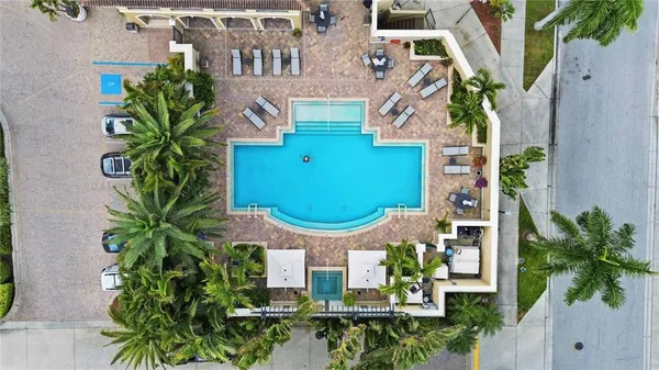 an aerial view of a house with a garden and plants