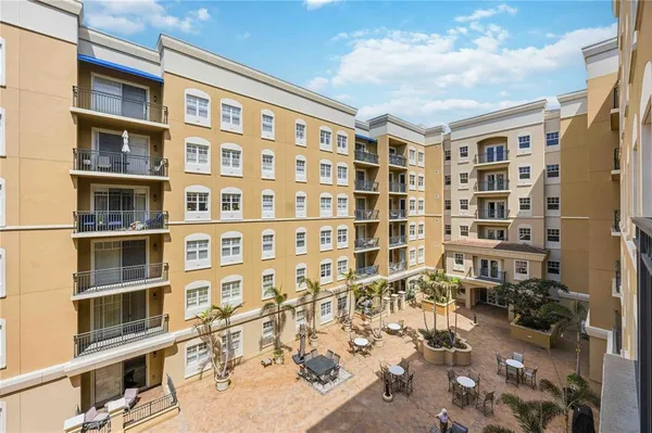 a view of a building with sitting area and sitting area