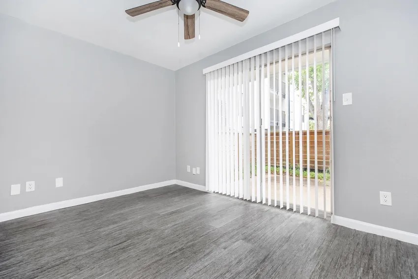 4400 Memorial Drive, Unit 43066 Houston, TX 77007 - Photo 1 of 20 an empty room with wooden floor and windows