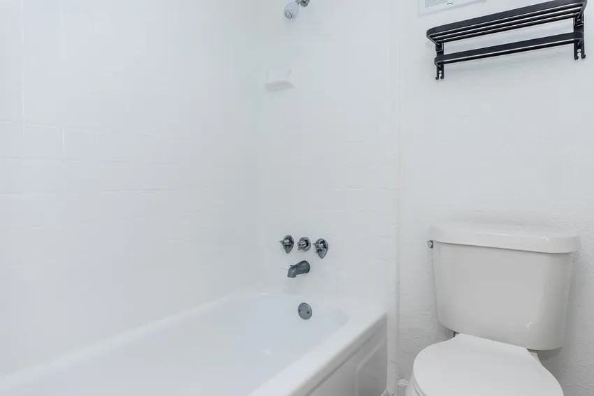 4400 Memorial Drive, Unit 43066 Houston, TX 77007 - Photo 19 of 20 a bathroom with a toilet and a tub