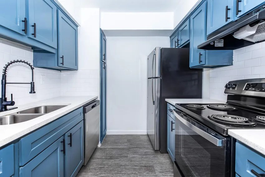 4400 Memorial Drive, Unit 43066 Houston, TX 77007 - Photo 2 of 20 a kitchen with stainless steel appliances granite countertop a sink stove and refrigerator