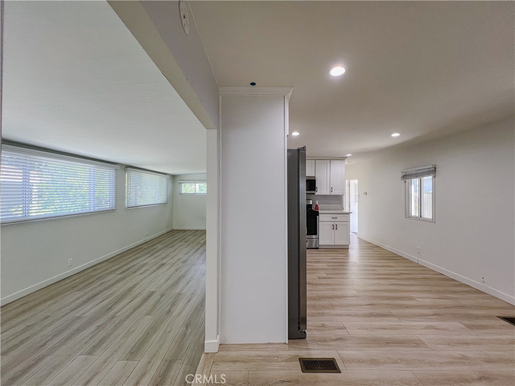 1245 West Cienega Avenue San Dimas, CA 91773 - Photo 11 of 14 a view of a living room with wooden floor