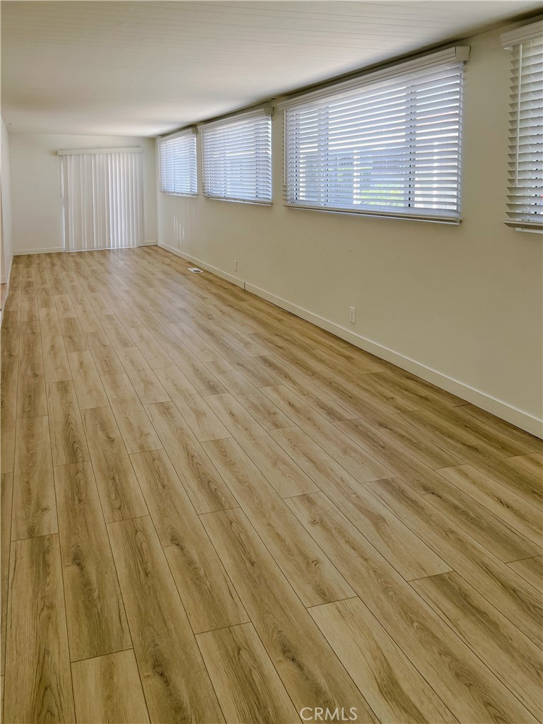 1245 West Cienega Avenue San Dimas, CA 91773 - Photo 13 of 14 wooden floor in an empty room