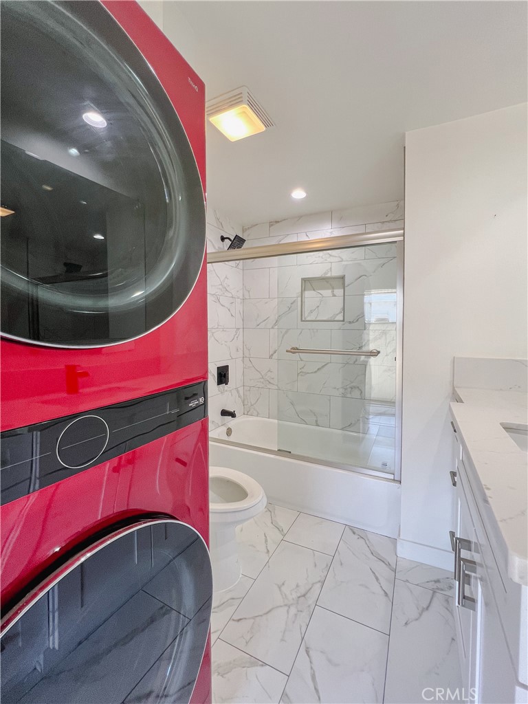 1245 West Cienega Avenue San Dimas, CA 91773 - Photo 8 of 14 a bathroom with a shower and a mirror