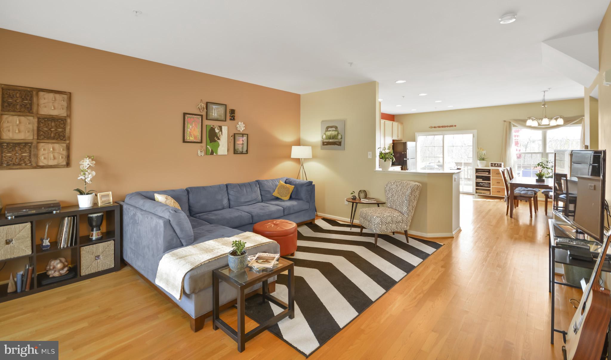 1741 Trestle Street Mount Airy, MD 21771 - Photo 2 of 30 a living room with furniture and a wooden floor