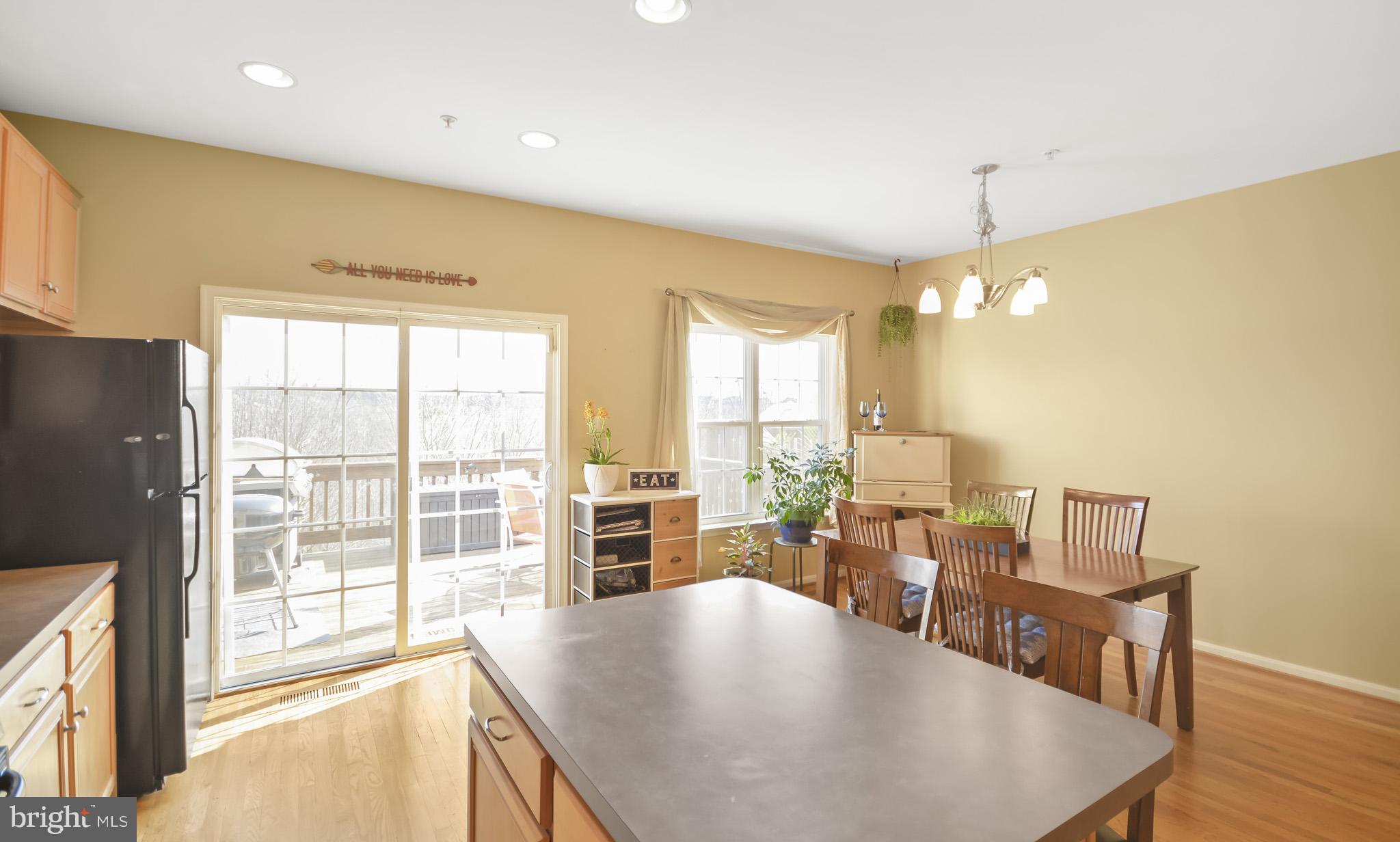 1741 Trestle Street Mount Airy, MD 21771 - Photo 14 of 30 a view of a dining room with furniture window and wooden floor