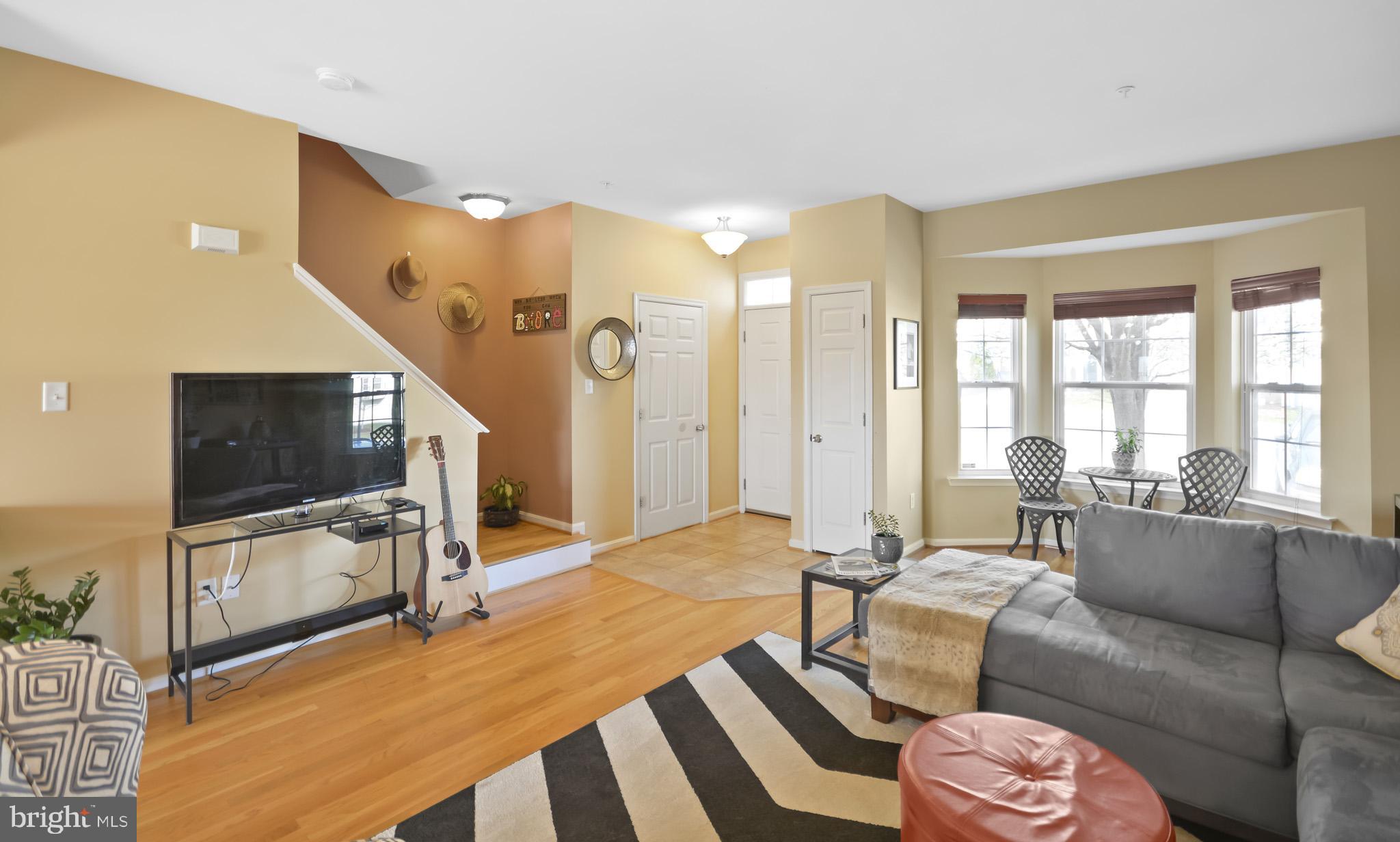 1741 Trestle Street Mount Airy, MD 21771 - Photo 3 of 30 a living room with furniture and a flat screen tv
