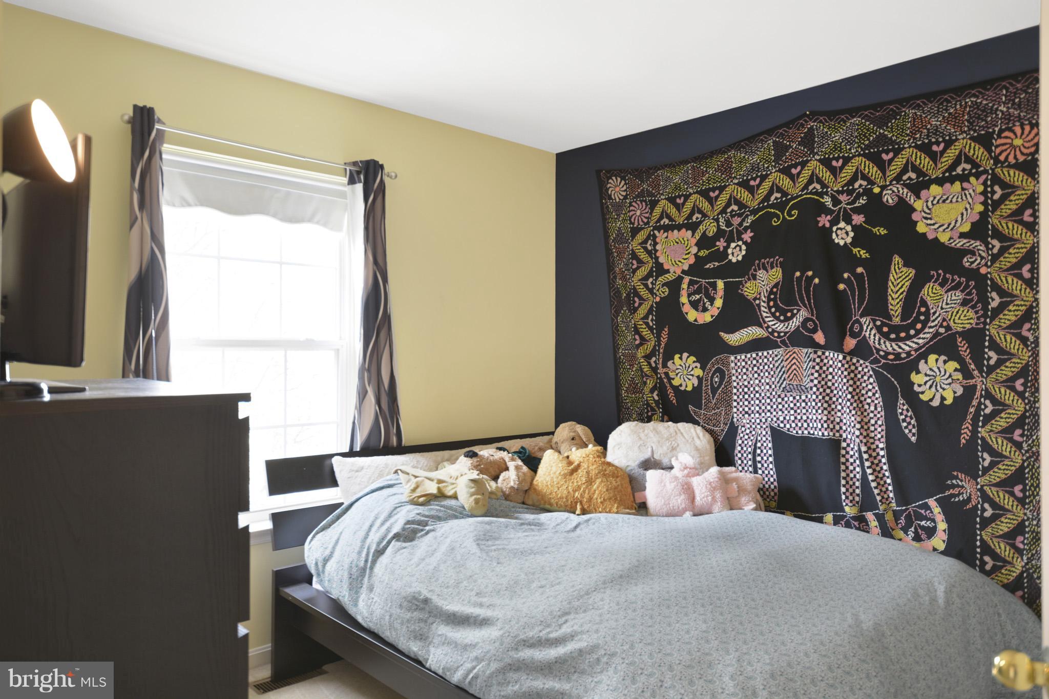 1741 Trestle Street Mount Airy, MD 21771 - Photo 24 of 30 a bedroom with a bed and a window