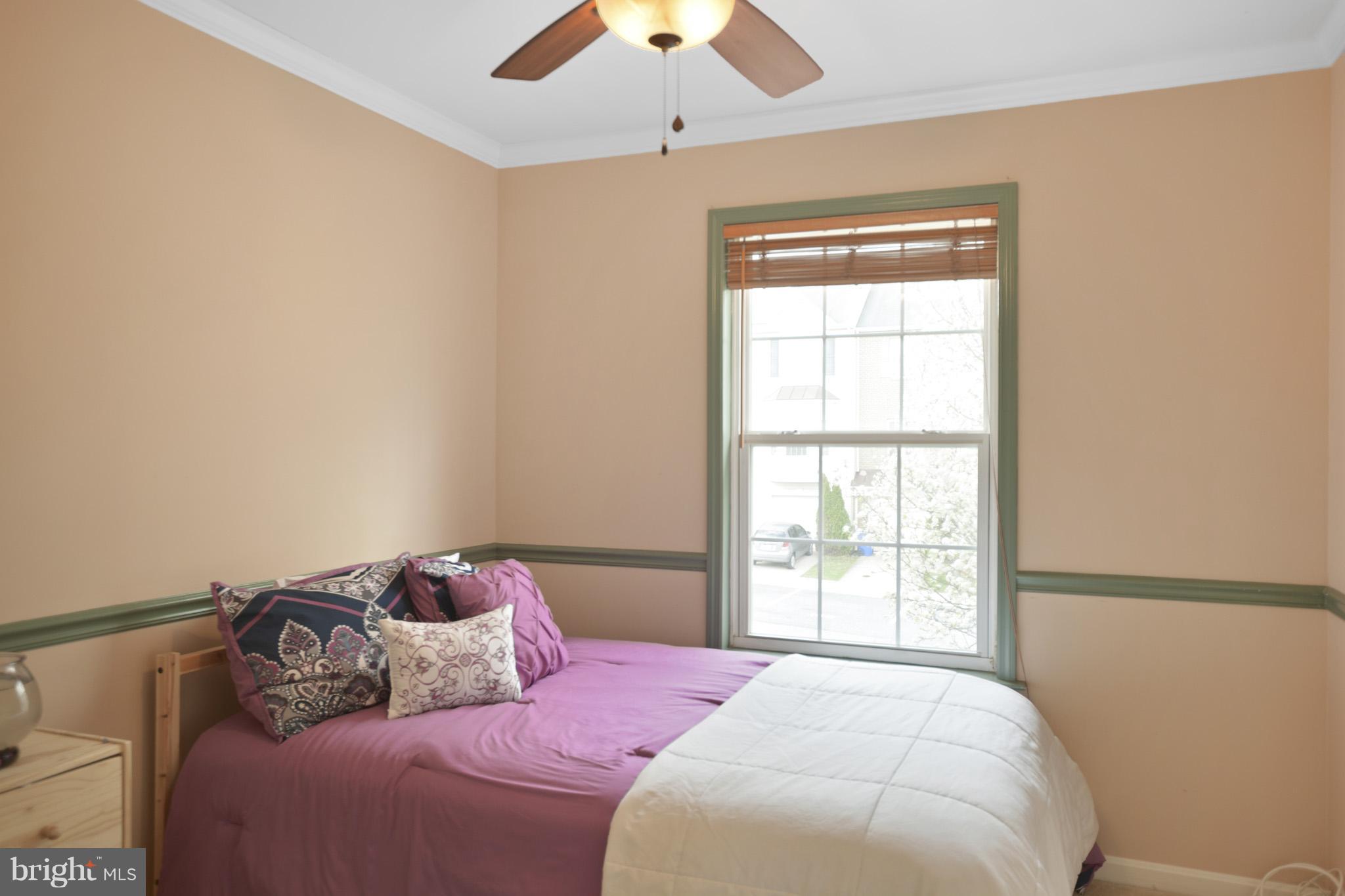 1741 Trestle Street Mount Airy, MD 21771 - Photo 25 of 30 a bedroom with a bed and a window