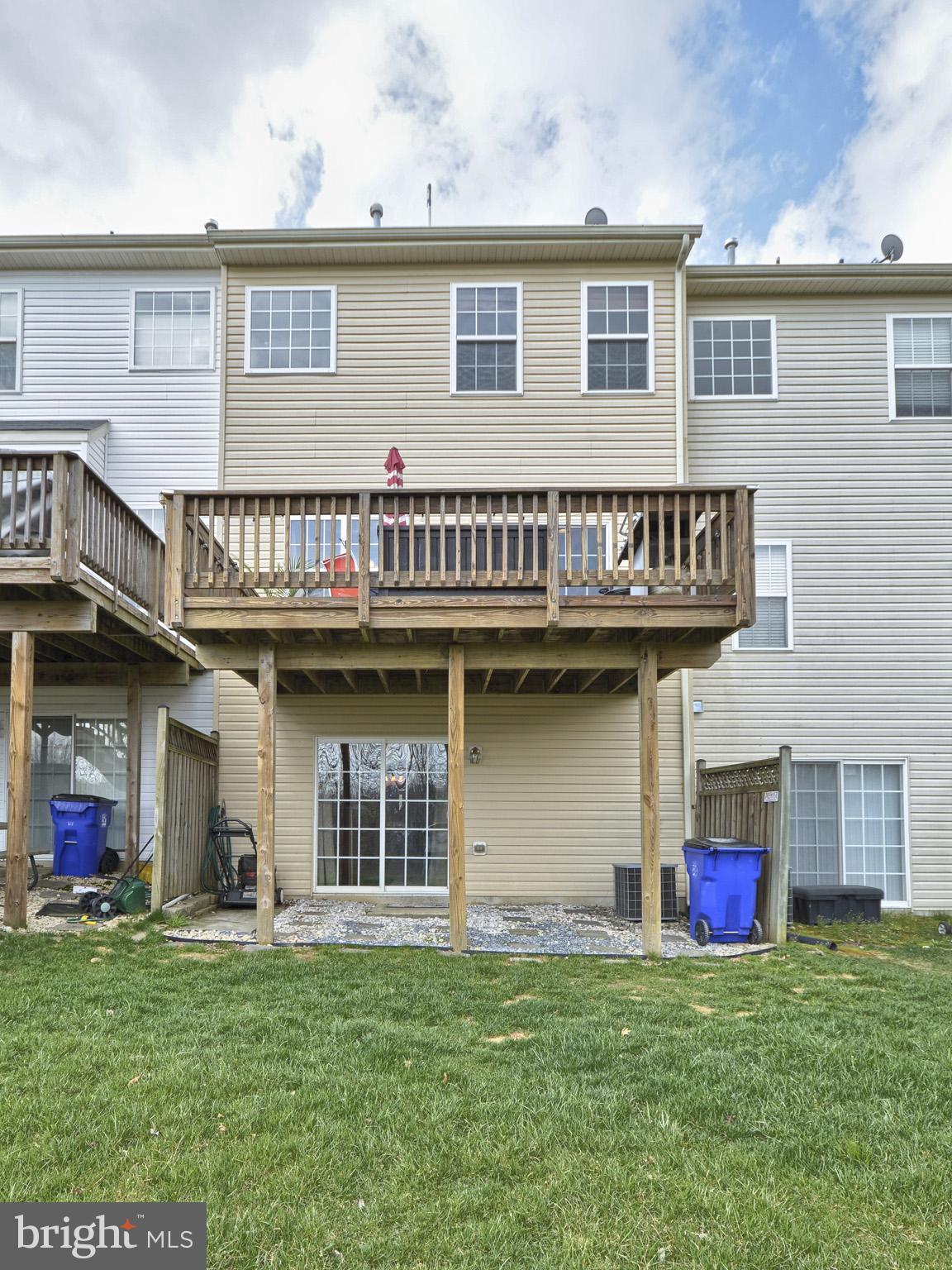 1741 Trestle Street Mount Airy, MD 21771 - Photo 26 of 30 a front view of a house with a garden and plants