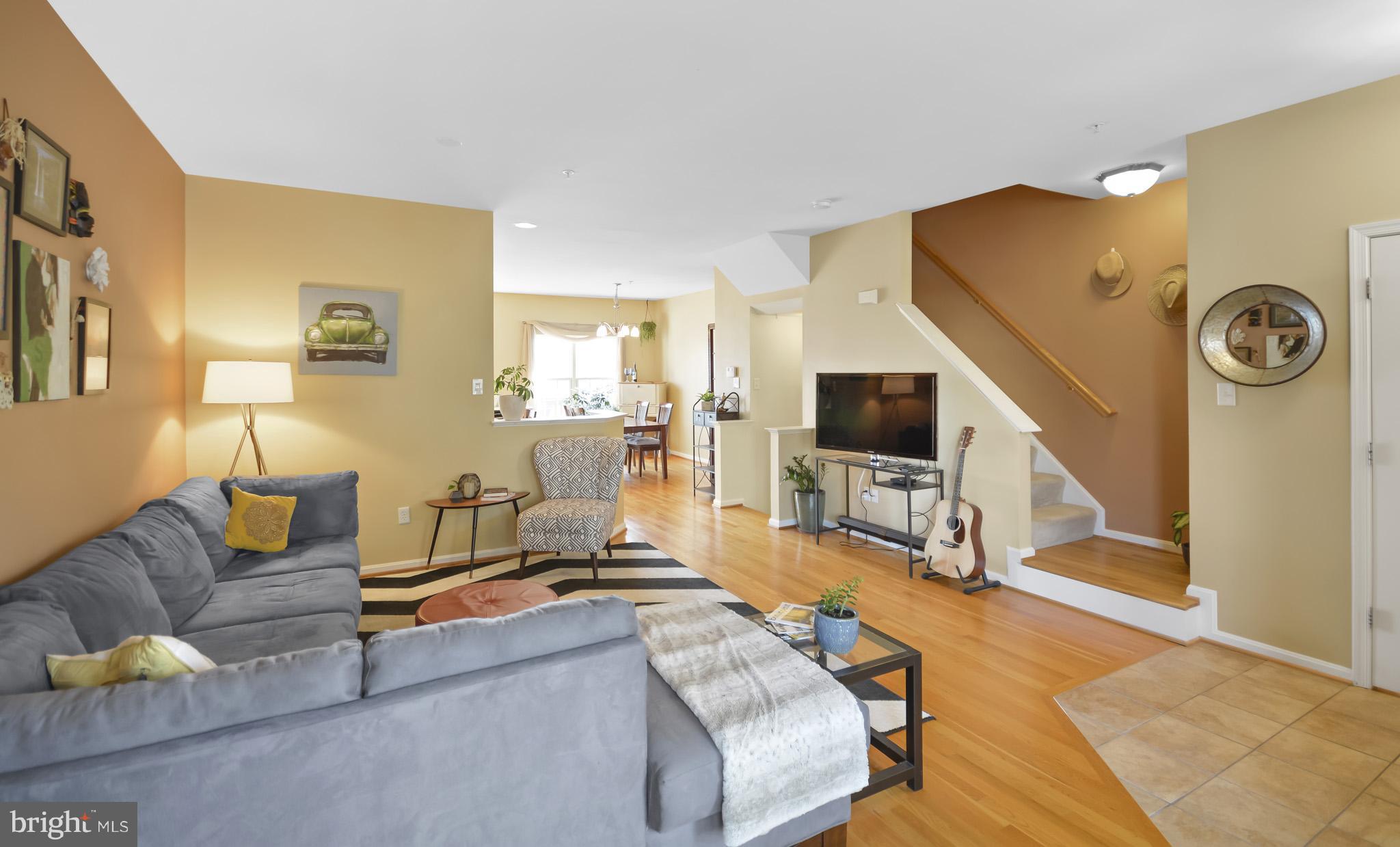 1741 Trestle Street Mount Airy, MD 21771 - Photo 10 of 30 a living room with furniture and a flat screen tv