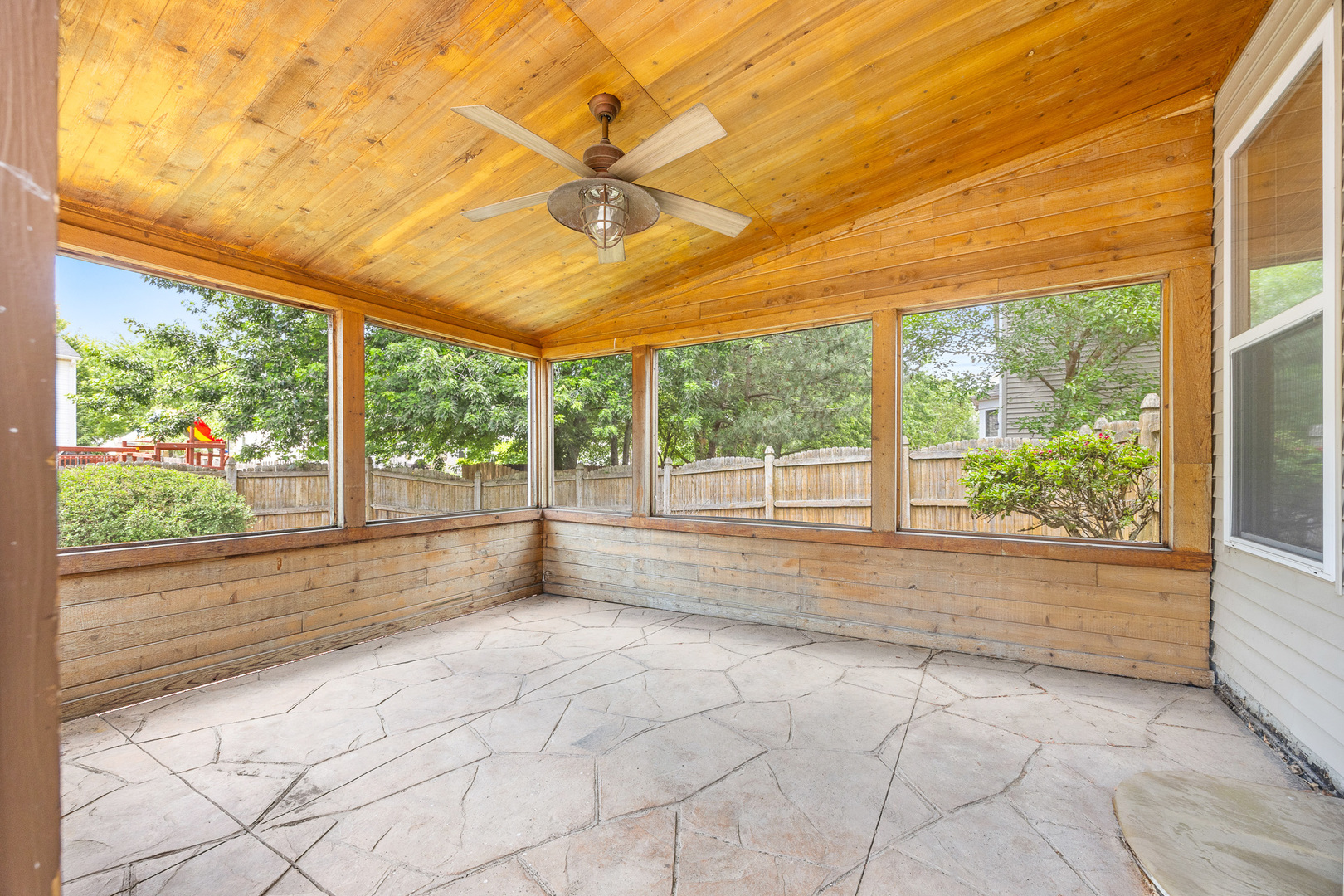 1301 Bridgehampton Drive Plainfield, IL 60586 - Photo 3 of 34 a view of empty room with wooden floor and fan