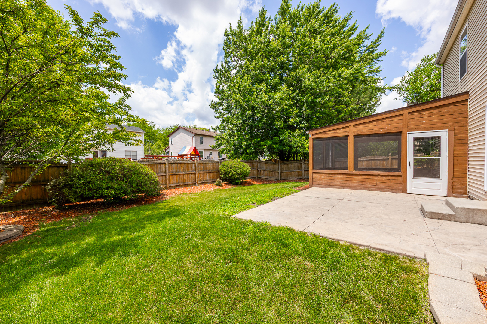 1301 Bridgehampton Drive Plainfield, IL 60586 - Photo 5 of 34 a house view with a garden space